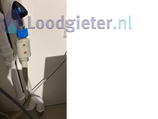 Loodgieter Bonkende waterleiding Plaatsen waterdemper wasmachine